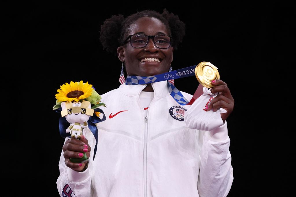 Gold medalist USA's Tamyra Mariama Mensah-Stock poses with her medal after the women's freestyle 68kg wrestling competition of the Tokyo 2020 Olympic Games.