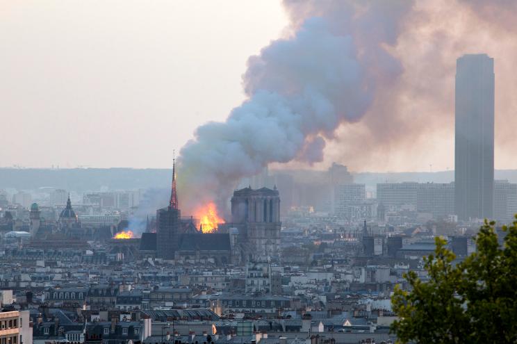 In this file photo dated Monday, April 15, 2019, Notre Dame cathedral is burning in Paris. After more than two-years of work to stabilize and protect it after the shocking fire that tore through its roof and knocked down its spire, FranceÕs Notre Dame Cathedral is finally stable and secure enough for artisans to start rebuilding it, according to a government statement Saturday Sept. 18, 2021.