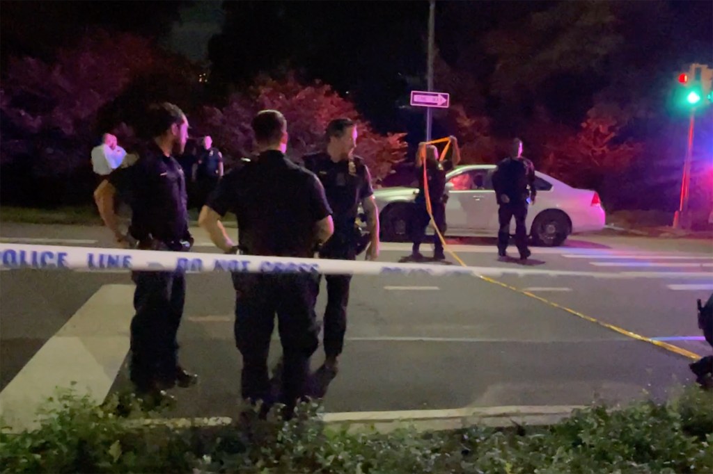 Police at the scene where a man and a woman were shot on the Upper West Side.