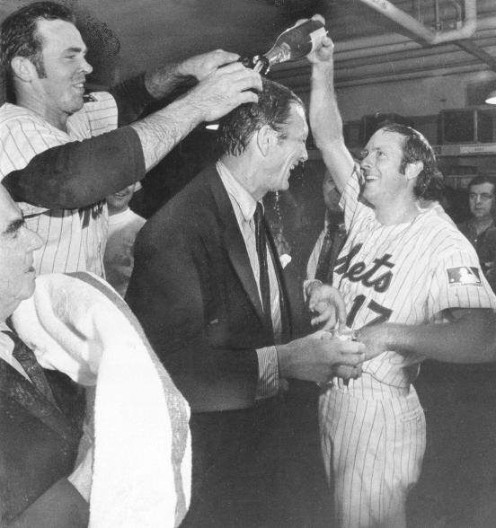 New York Mets Jerry Grote, left, and Rod Gaspar douse New York City Mayor John Lindsay with champagne after the Mets won the National League pennant against the Atlanta Braves, Oct. 6, 1969.