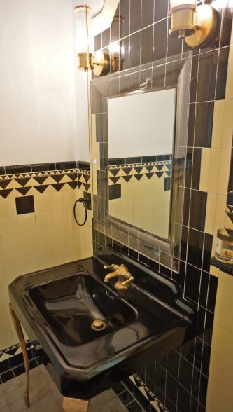 A downstairs bathroom in Al Capone's mansion still has the faux gold faucets, as seen September 7, 2012. Capone's grandniece Deidre Marie Capone, 72, toured the mobster's former mansion on Palm Island.