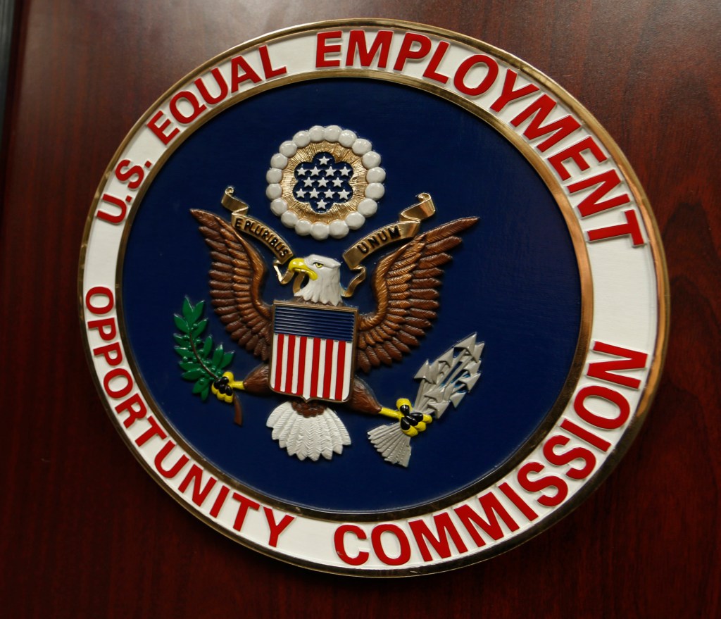 The emblem of the U.S. Equal Employment Opportunity Commission is shown