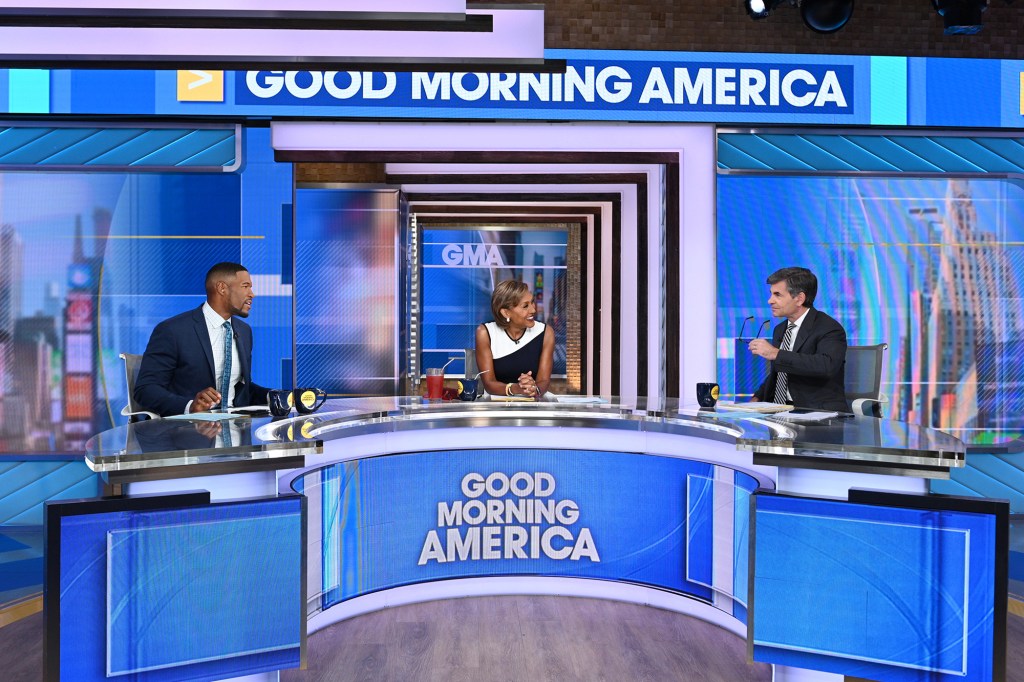 MICHAEL STRAHAN, ROBIN ROBERTS, GEORGE STEPHANOPOULOS anchoring "Good Morning America"