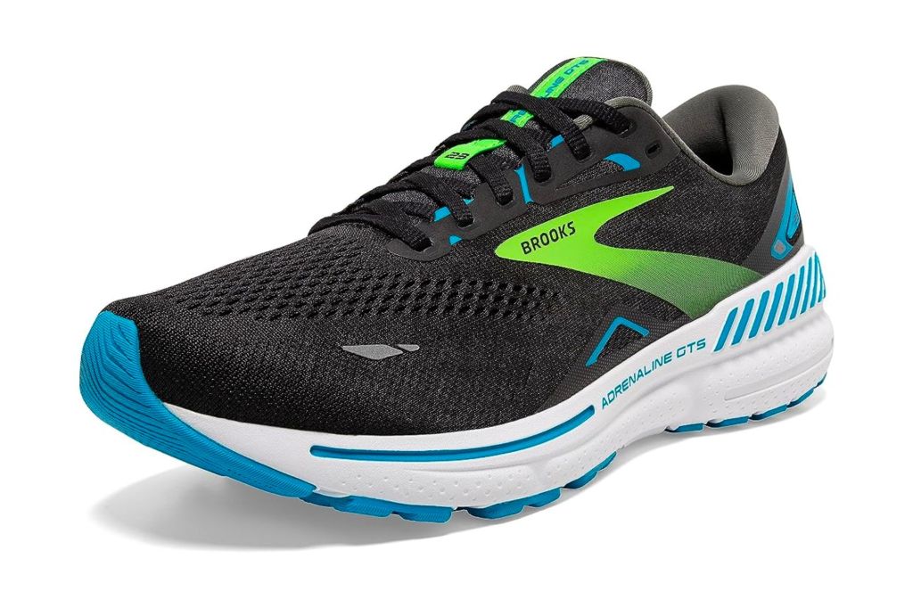 Black, green, blue and white men's running sneaker.