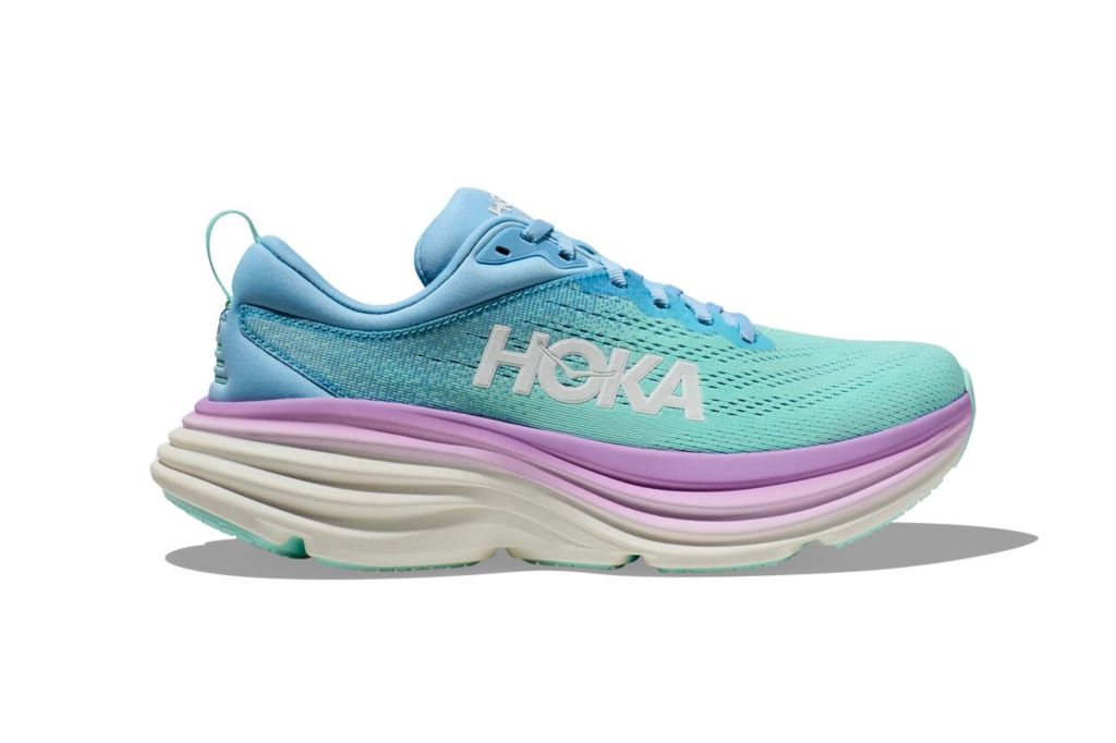 Light blue and purple running shoe for women.