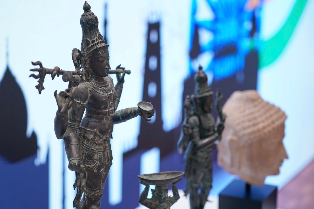 Some of the stolen objects being returned to India are displayed during a ceremony at the Indian consulate in New York, Thursday, Oct. 28, 2021.