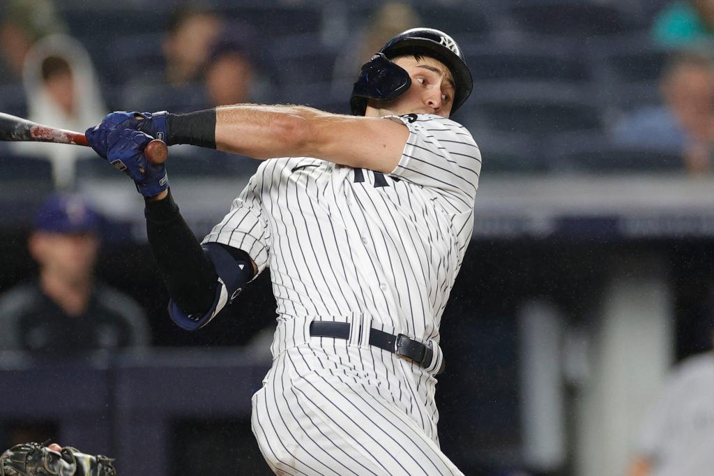 Joey Gallo #13 of the New York Yankees hits during the seventh inning against the Texas Rangers at Yankee Stadium on September 21, 2021 in the Bronx borough of New York City.