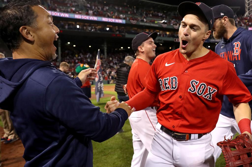 Enrique Hernandez #5 of the Boston Red Sox reacts after beating the New York Yankees 6-2 in the American League Wild Card game at Fenway Park on October 05, 2021 in Boston, Massachusetts.