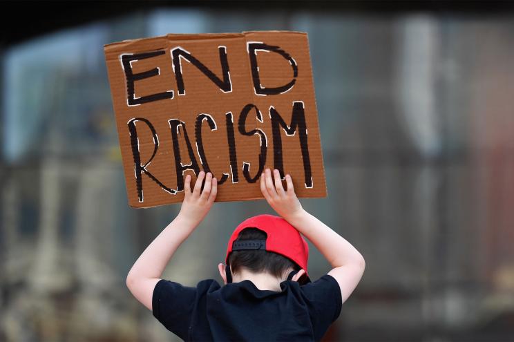 Families participate in a children's march in solidarity with the Black Lives Matter movement and national protests against police brutality on June 9, 2020 in the Brooklyn Borough of New York City.