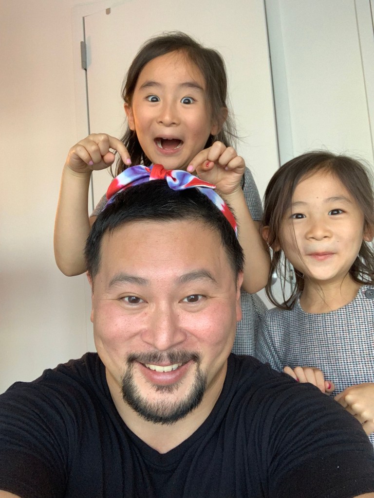 New York State Assemblyman Ron Kim is pictured with his daughters who are in the Gifted and Talented program at PS 32, in Flushing.