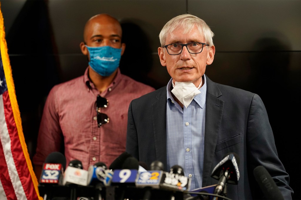 Wisconsin Gov. Tony Evers speaks during a news conference in Kenosha, Wis.