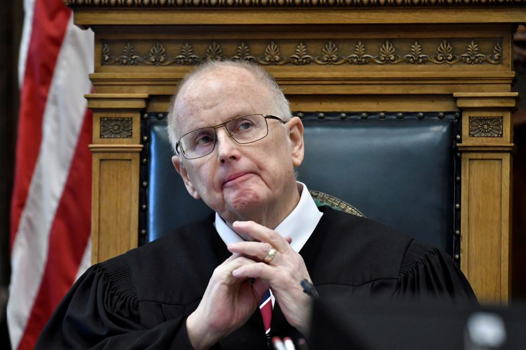 Judge Bruces Schroeder listens to attorneys before the jury is let into the room for Kyle Rittenhouse's trial.