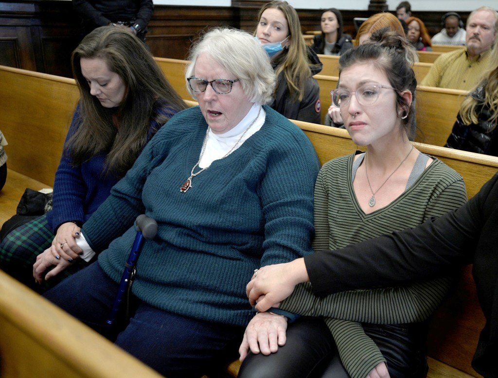 Kariann Swart, Joseph Rosembaum's fiancee, Susan Hughes, Anthony Huber's great-aunt, and Hannah Gittings, Anthony Huber's girlfriend, listen to the verdict during Kyle Rittenhouse's trial.