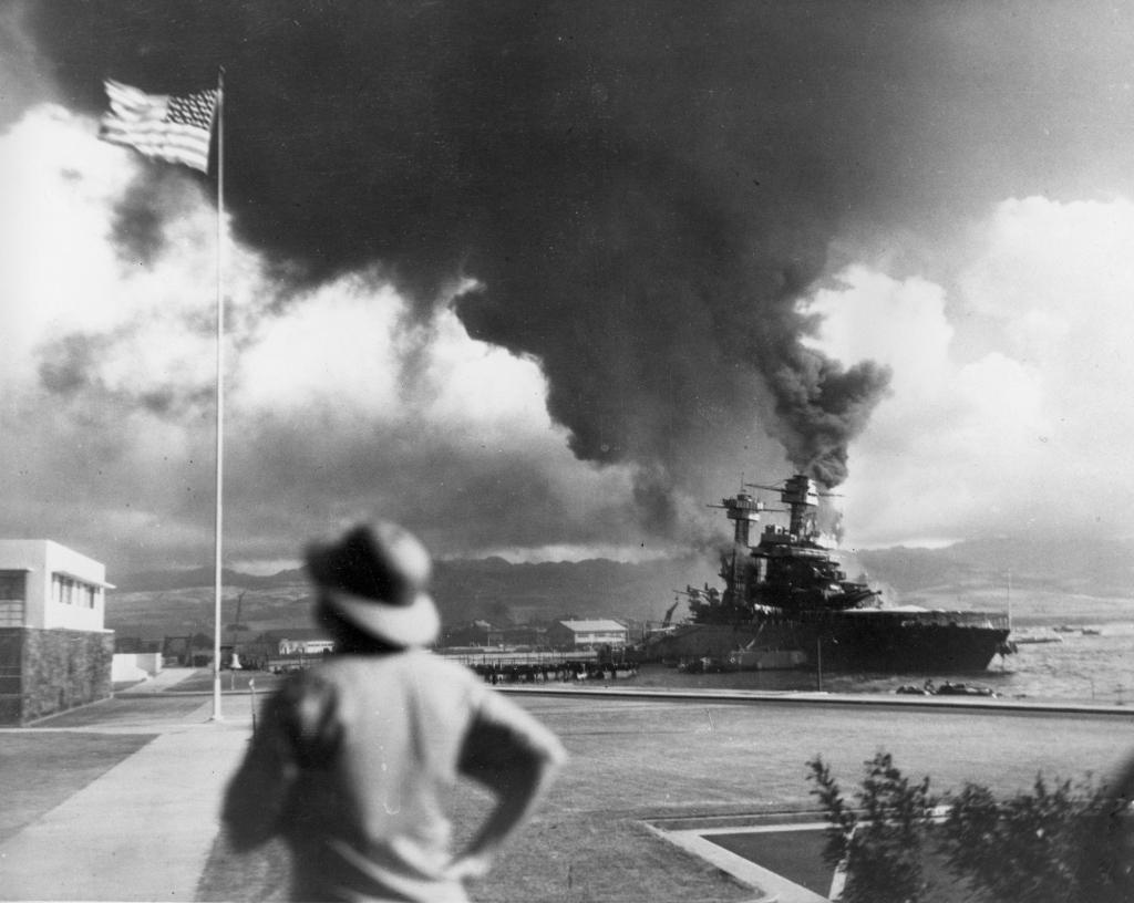 American ships burn during the Japanese attack on Pearl Harbor, Hawaii.