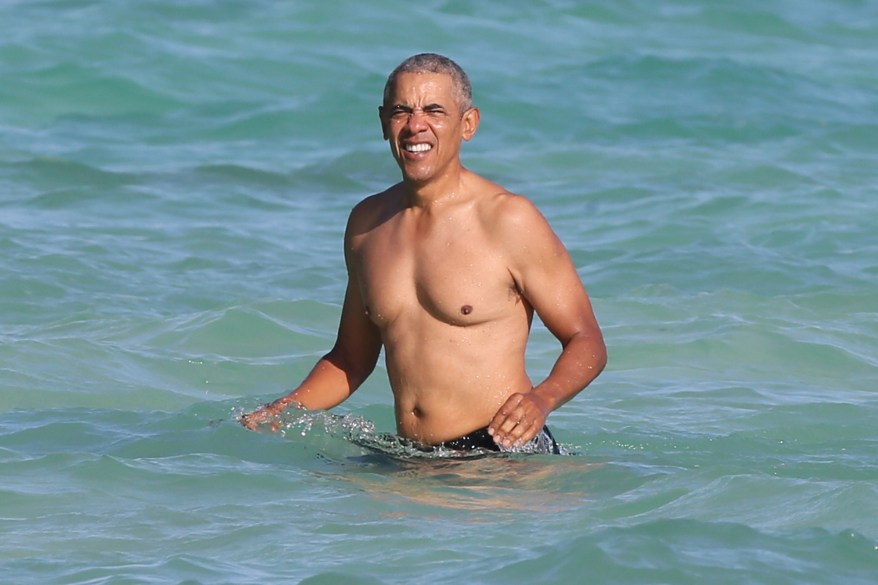 Former President Barack Obama takes some holiday time in his native Hawaii with the fam.