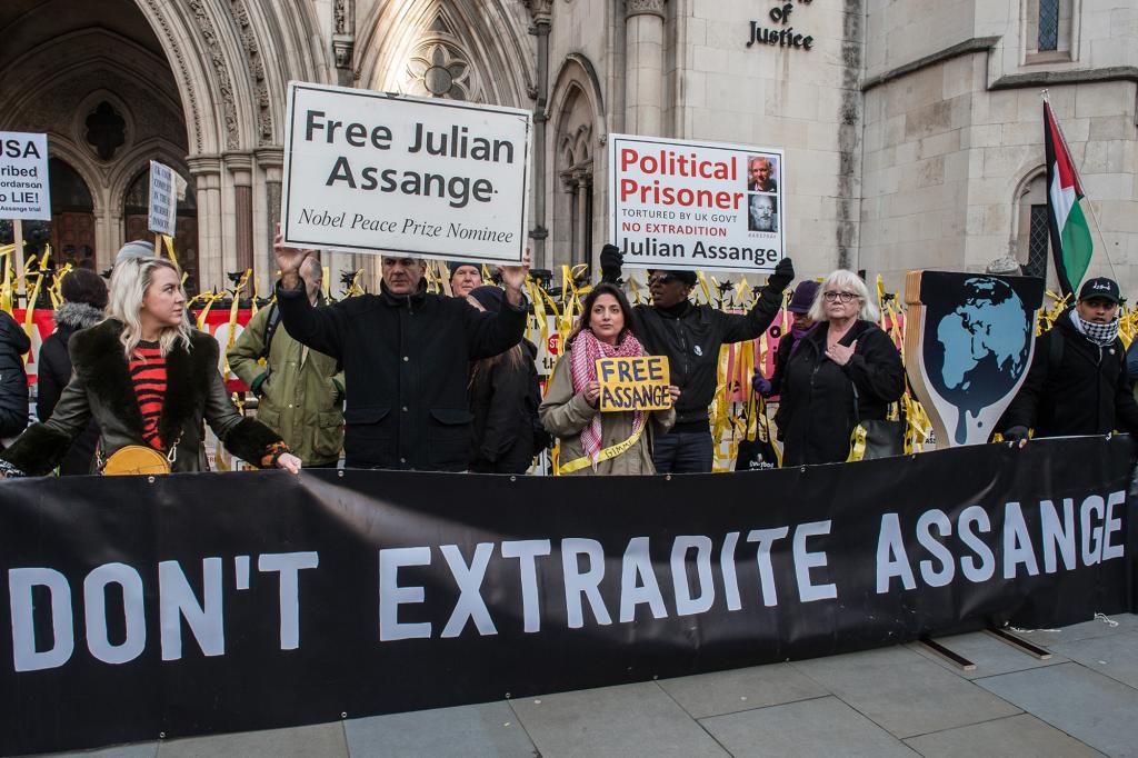 Supporters of Julian Assange outside England's High Court following the extradition ruling.