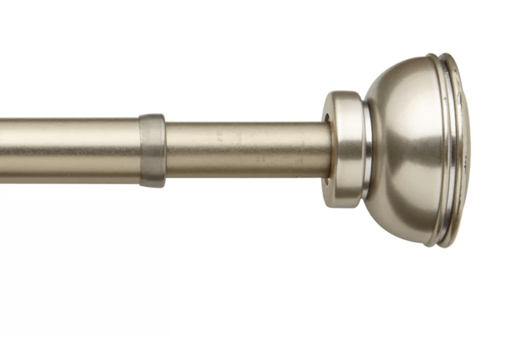 A gold curtain rod 