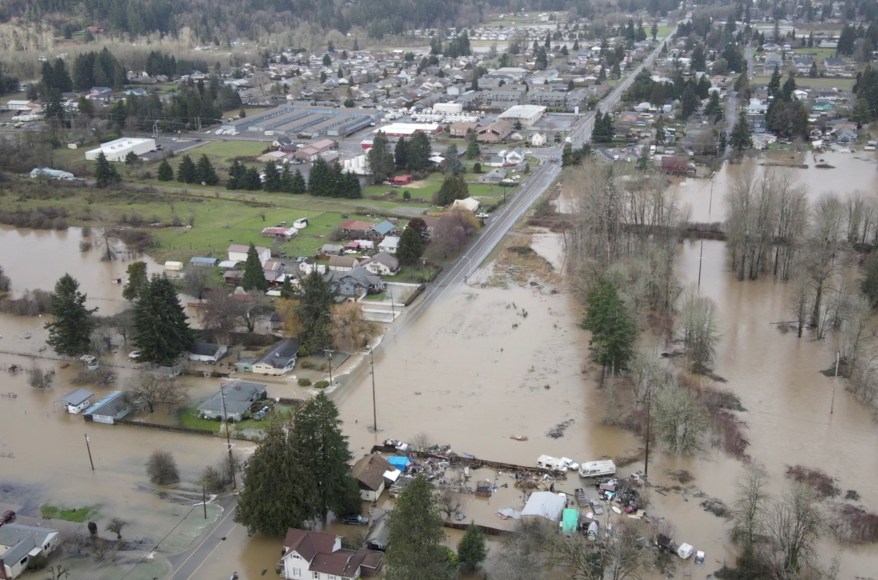 Buildings and road are seen submerged in floodwaters due to heavy rain in Centralia, Washington.