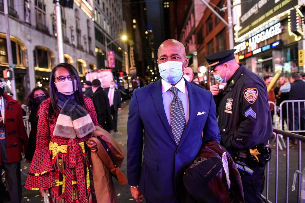 Eric Adams arrives in Times Square.