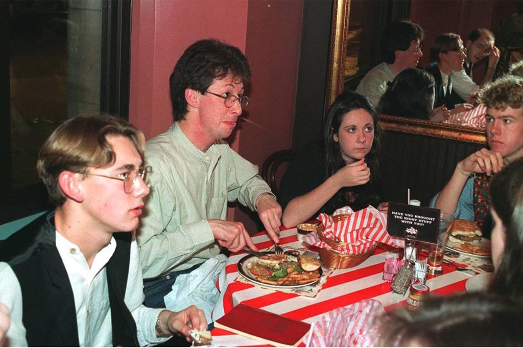 Brandon Lee, whose real name was Brian MacKinnon, eating at TGI Fridays with high school students. 