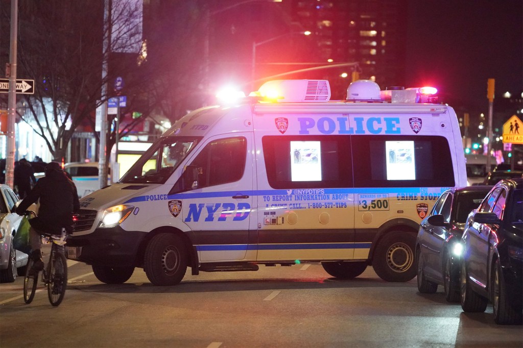 The scene where two NYPD officers were shot on W135th Street at Lenox Avenue in New York, NY on Jan. 21, 2022.