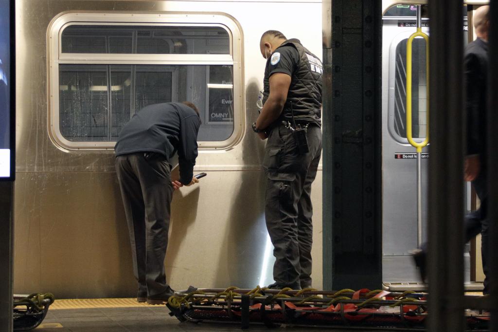 A woman was shoved in front of an incoming R Train on west 42nd Street and killed.