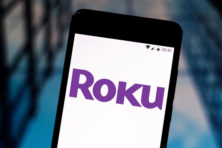 Roku logo displayed on a smartphone