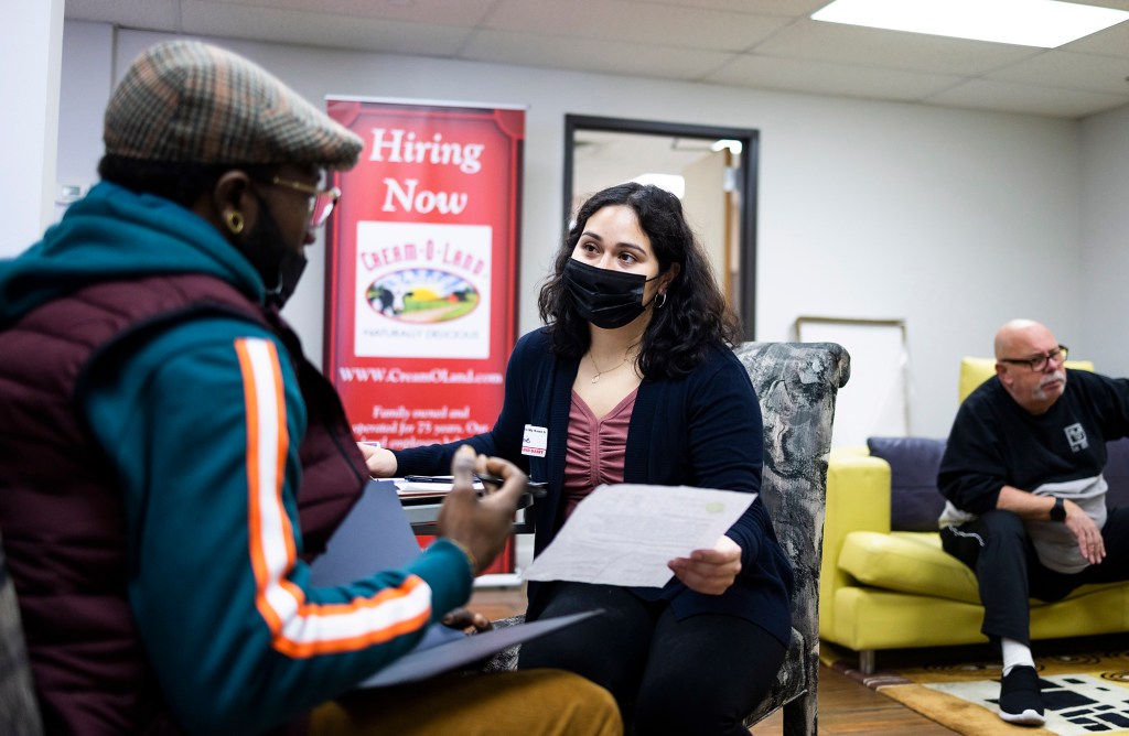 Jeannie Santamaria (center), a human resources coordinator for the Cream-O-Land during a job fair for truck drivers and warehouse workers at the company’s warehouse in Jersey City.