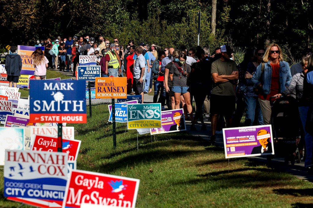 People line up to cast their in-person absentee ballots at the Berkeley County Library on October 30, 2020 in Hanahan, South Carolina.