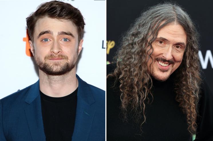 Daniel Radcliffe and Weird Al smile at the camera.