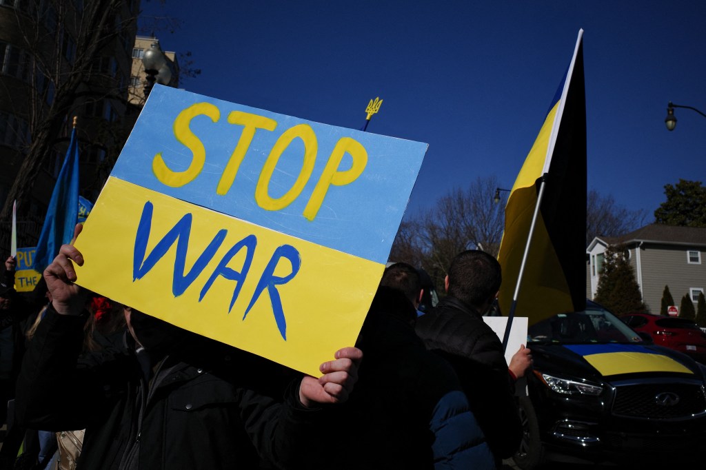 Activists protest against Russias invasion of Ukraine during a rally in front of the Russian embassy in Washington, DC.