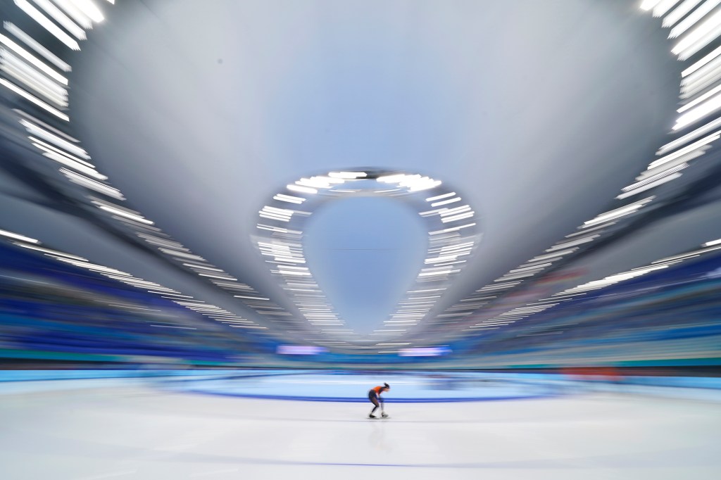 An athlete from the Netherlands skates during a speed skating practice session ahead of the 2022 Winter Olympics, Thursday, Feb. 3, 2022, in Beijing.