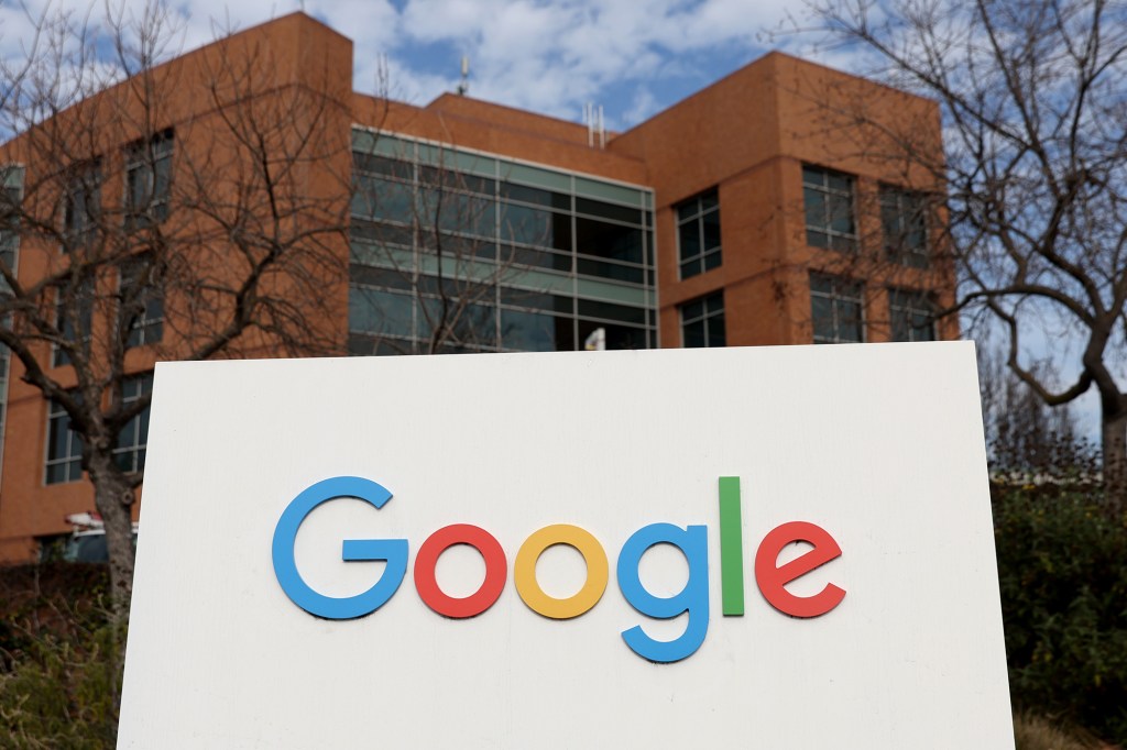 Google sign posted in front of a building on the Google campus in California