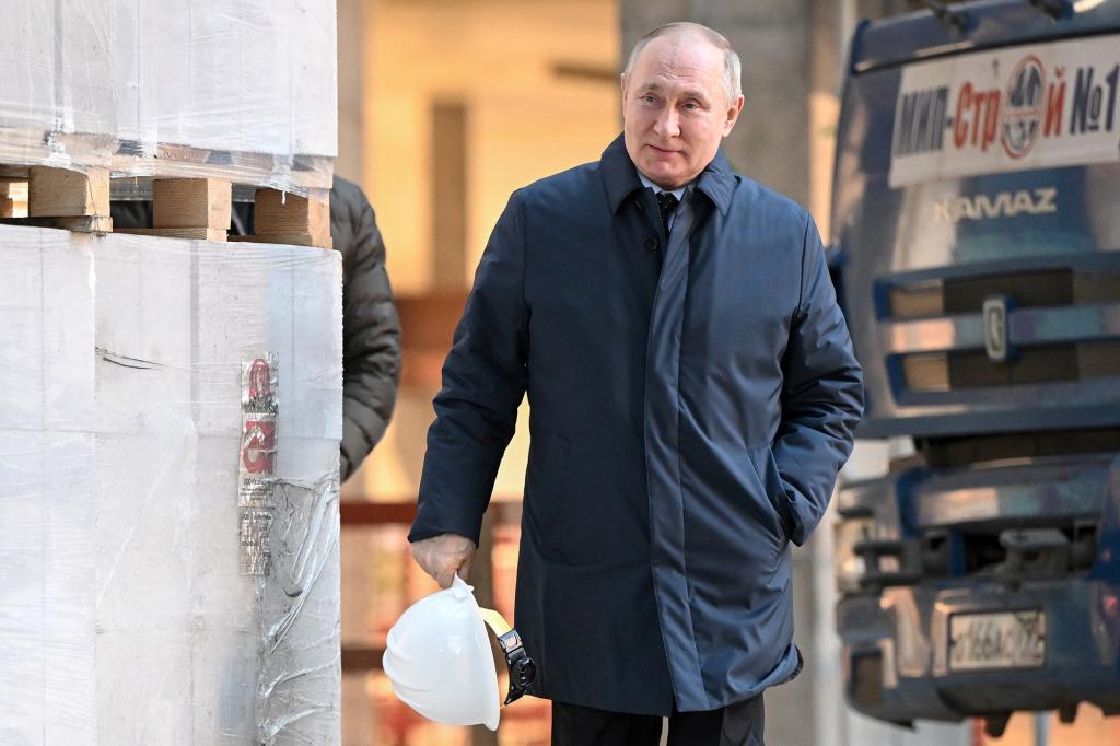 Russian President Vladimir Putin visits the construction site of the National Space Agency.