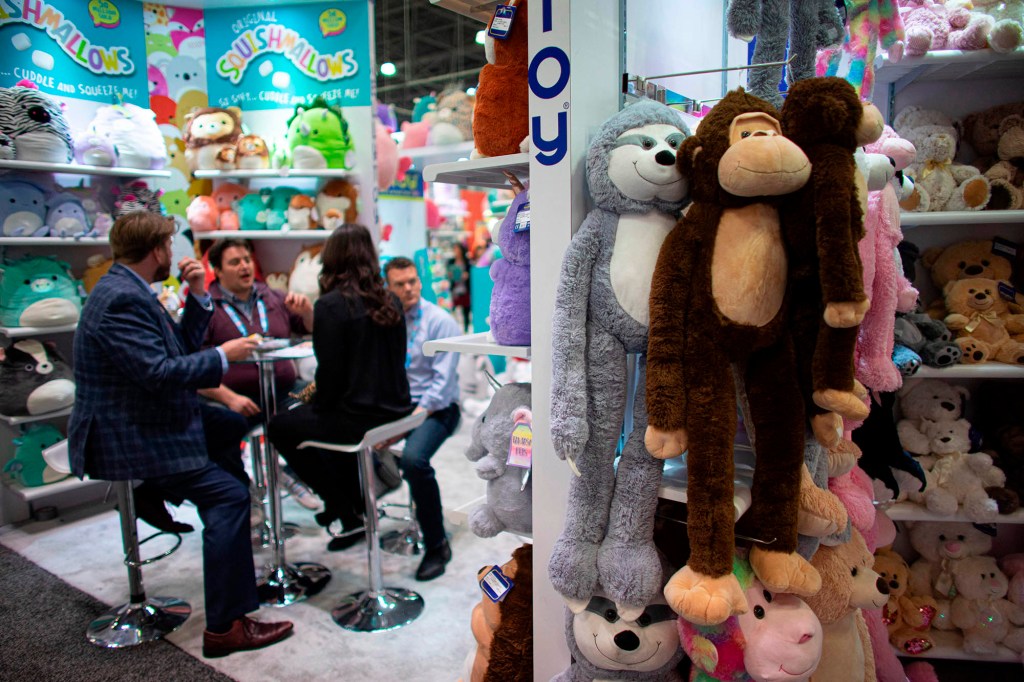 A booth at Toy Fair displaying stuffed animals.