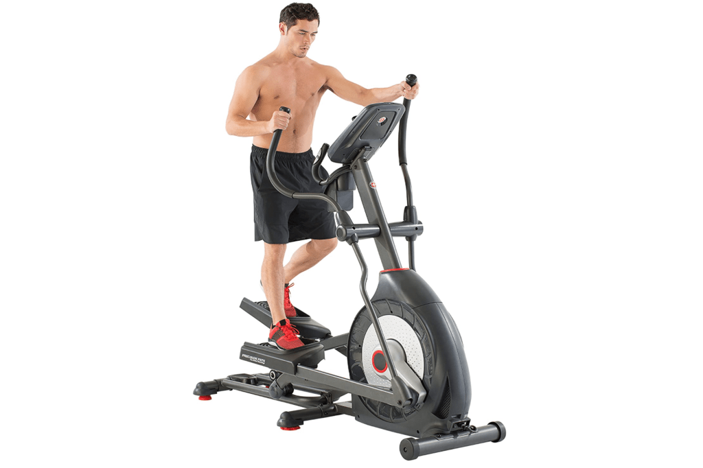 Man on large elliptical