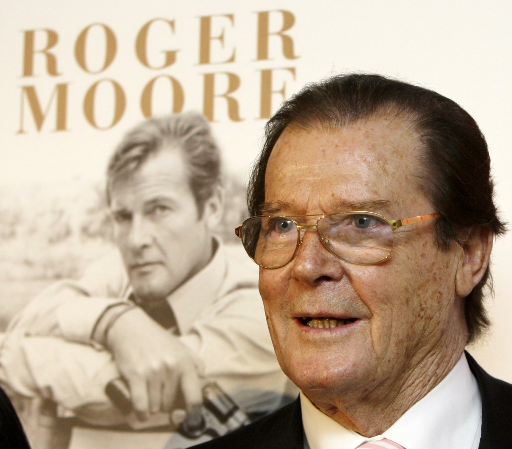 British actor Roger Moore attends a news conference to promote his latest book "The World is My Bond" in Hong Kong.