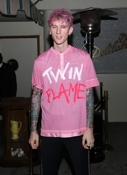 Machine Gun Kelly wears "twin flame" shirt