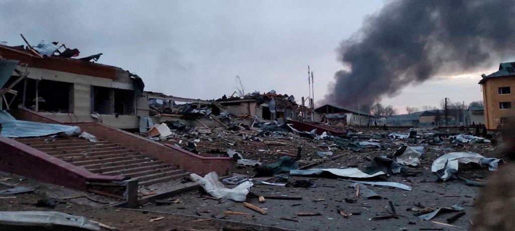 Smoke rising from damaged buildings after a Russian attack on a military base in Yavoriv, Ukraine on March 13, 2022.