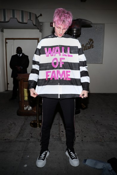 Machine Gun Kelly wearing "wall of fame" shirt