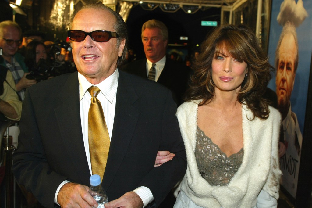 Jack Nicholson and Lara Flynn Boyle attend a 2002 movie premiere.