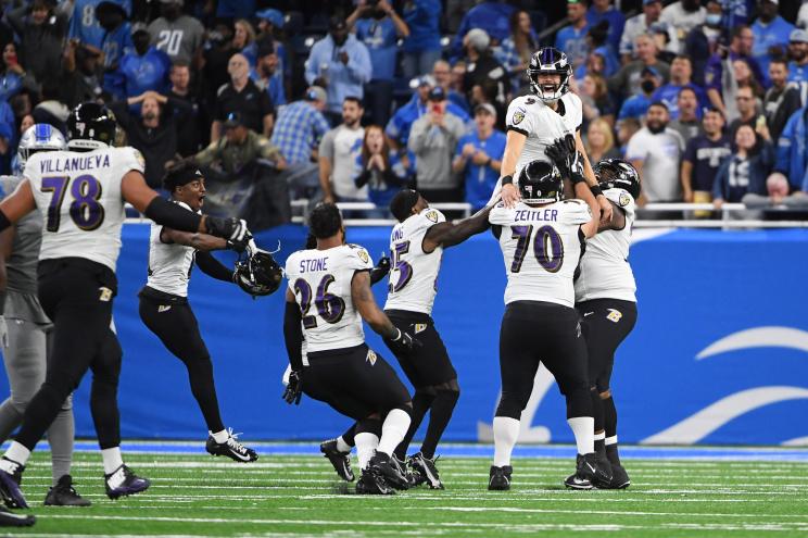 Justin Tucker #9 of the Baltimore Ravens celebrates a winning field goal.