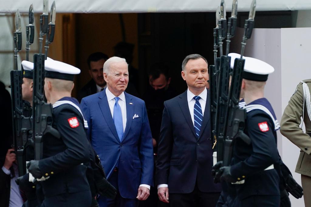 President Joe Biden participates in an arrival ceremony with Polish President Andrzej Duda at the Presidential Palace, Saturday, March 26, 2022