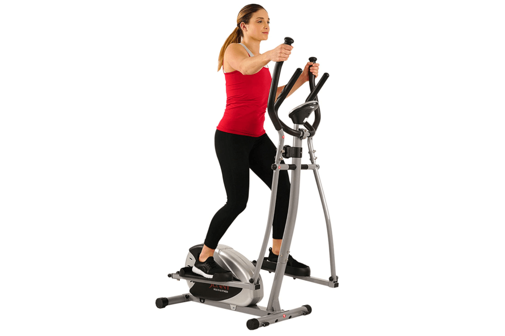 Woman on thin silver elliptical