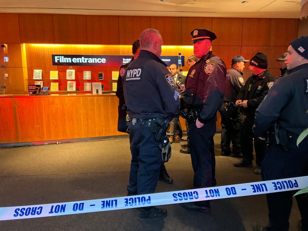 Police gather at the MOMA after a stabbing that occurred on March 13, 2022.