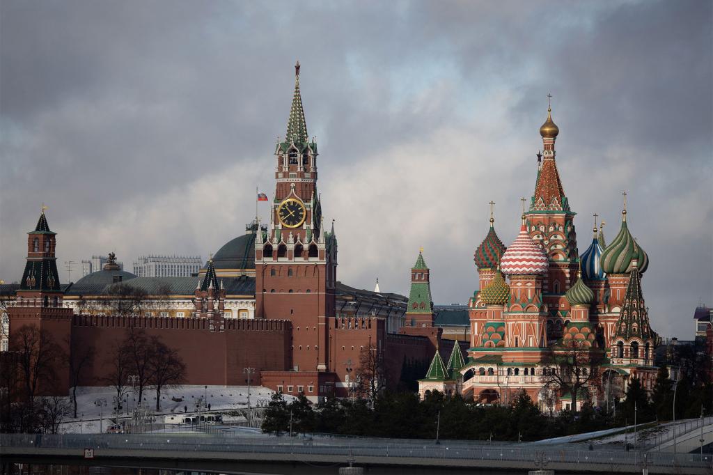 The Spasskaya tower of the Kremlin, center, and Saint Basil's Cathedral, right, in Moscow, Russia, on Tuesday, Feb. 22, 2022.