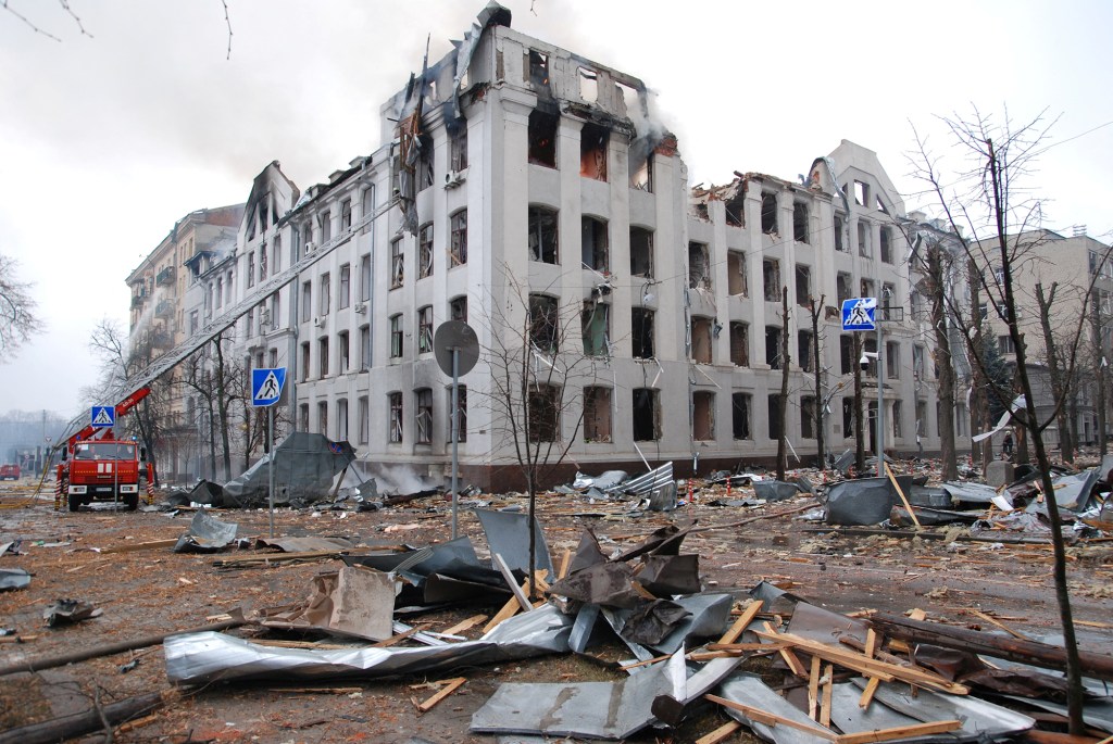 Firefighters work to extinguish a fire at the Kharkiv National University building, which city officials said was damaged by recent shelling.