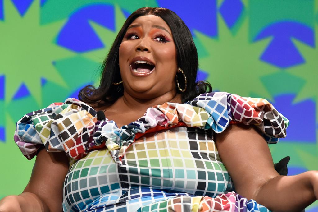 Lizzo in a geometric patterned dress.