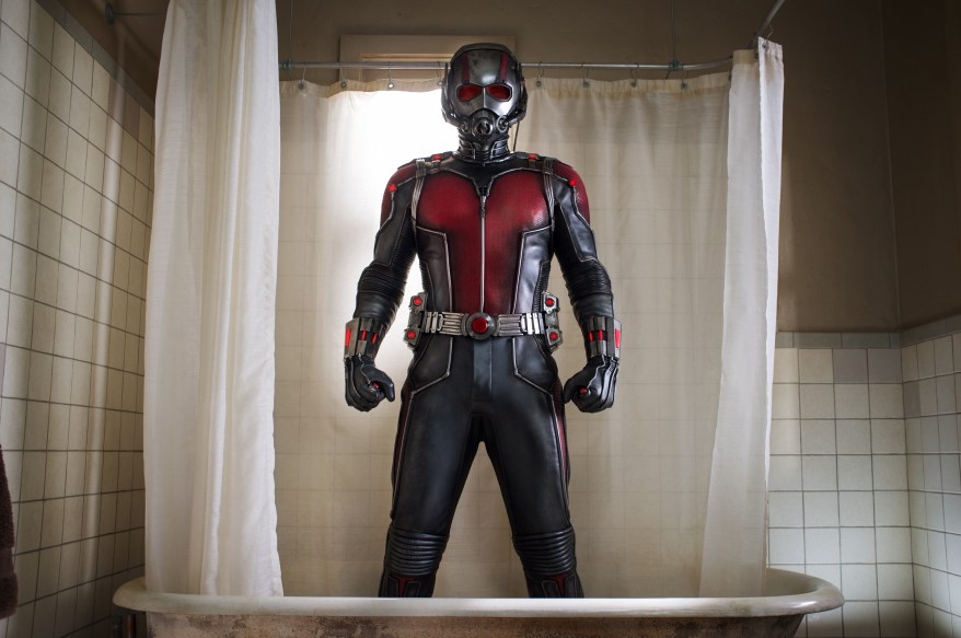 Paul Rudd standing in bathtub dressed as Ant-Man