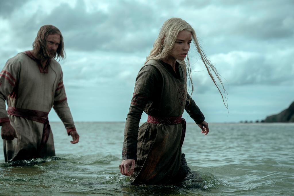 This image released by Focus Features shows Alexander Skarsgård, left, and Anya Taylor-Joy in a scene from "The Northman."